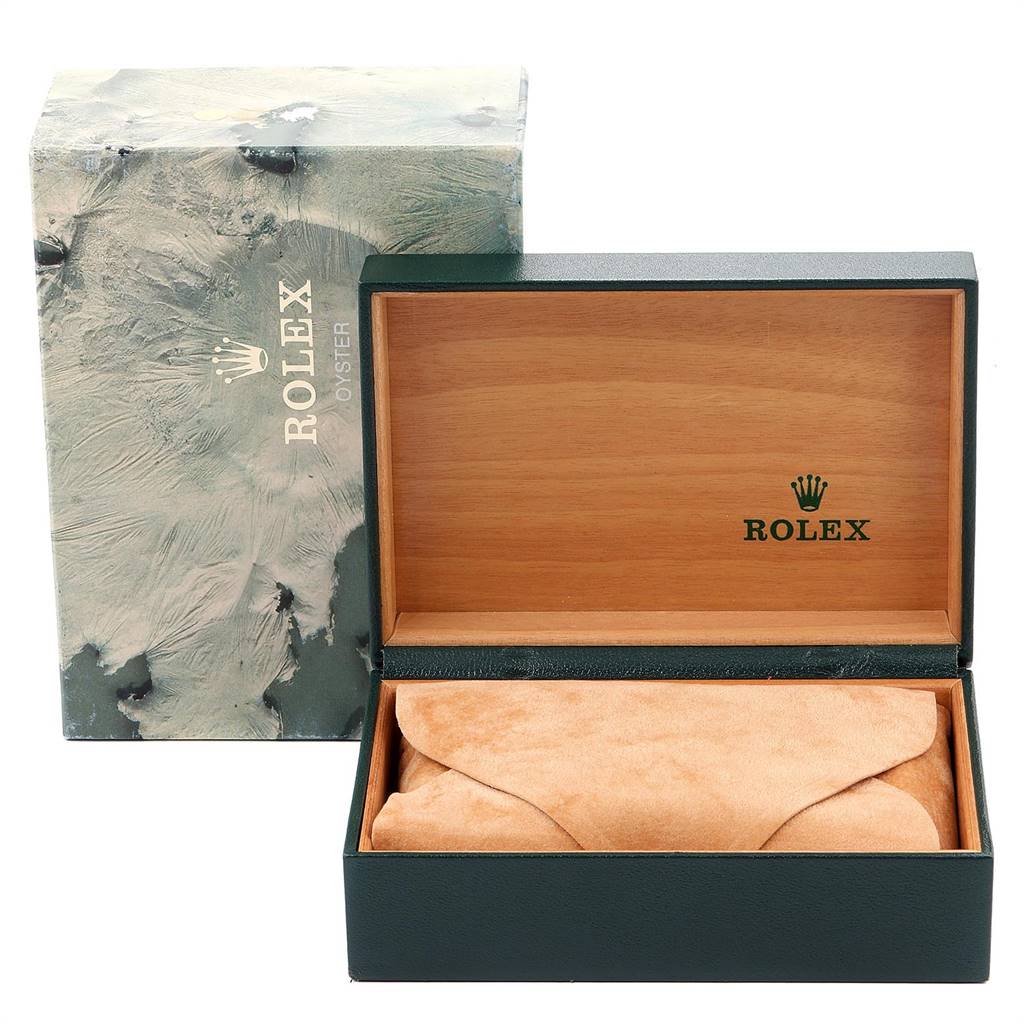 The image shows an open Rolex Datejust 16233 Men
s Steel and Gold (two tone) Black Dial 16233 Men
s Steel and Gold (two tone) Black Dial box with the outer protective cover next to it.