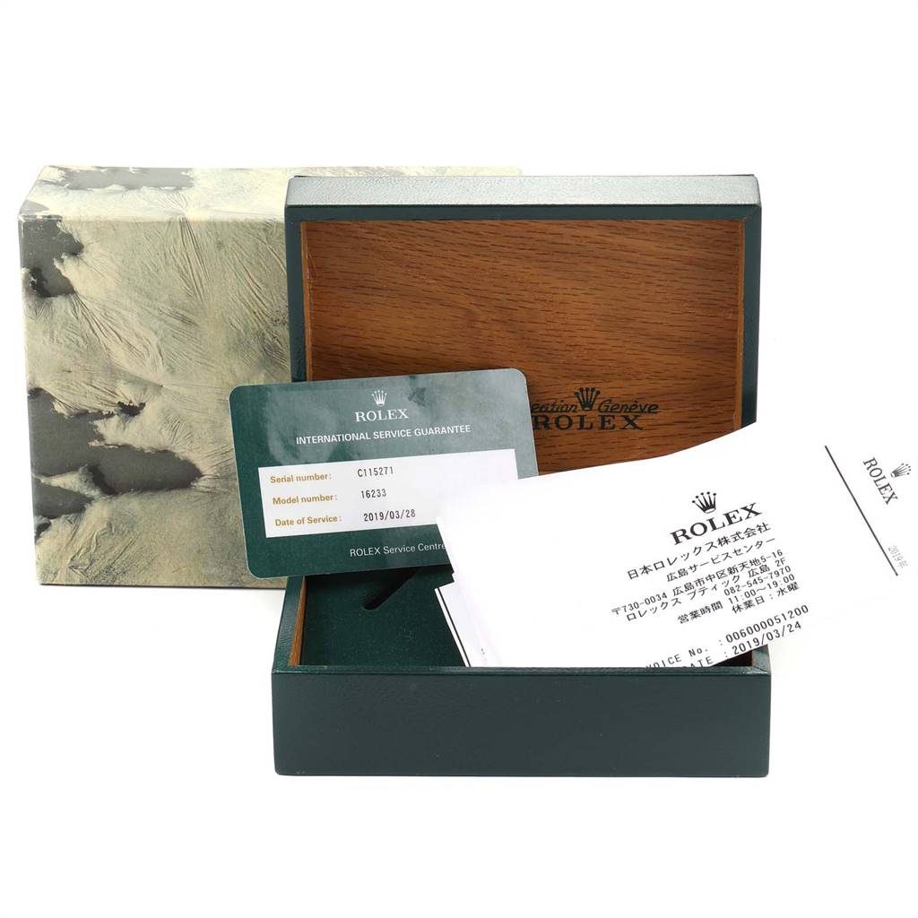The image shows the box, international service guarantee card, and documents for a Rolex Datejust 16233 Men's Steel and Gold (two tone) Champagne Dial 16233 Men's Steel and Gold (two tone) Champagne Dial model.