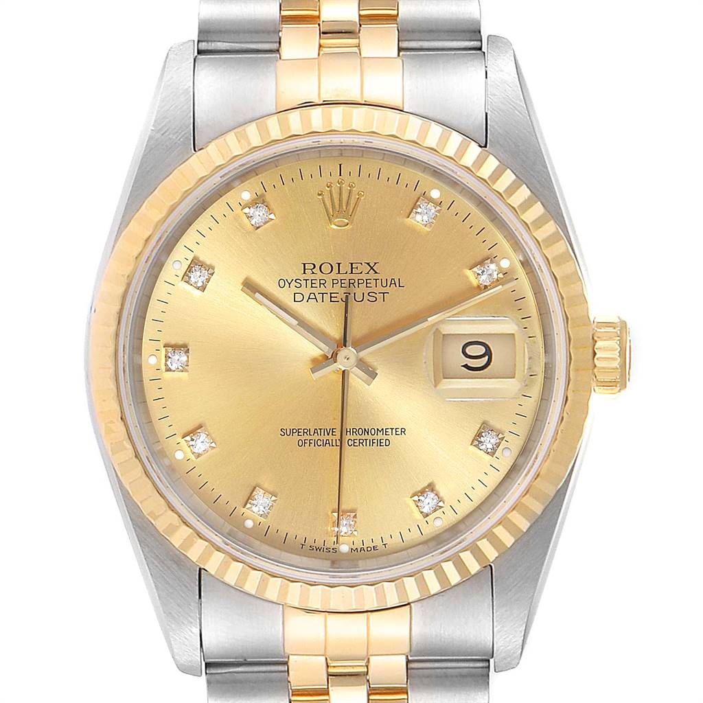 The image shows the Rolex Datejust 16233 Men's Steel and Gold (two tone) Champagne Dial 16233 Men's Steel and Gold (two tone) Champagne Dial watch from a front angle, highlighting its dial, fluted bezel, and two-tone bracelet.