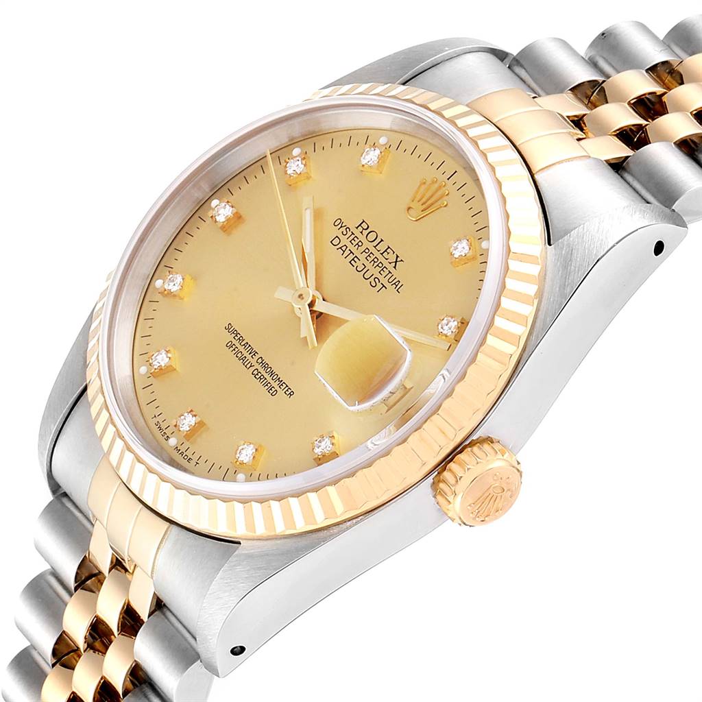 This image shows a Rolex Datejust 16233 Men's Steel and Gold (two tone) Champagne Dial 16233 Men's Steel and Gold (two tone) Champagne Dial watch from an angled side view, highlighting the dial, bezel, crown, and part of the bracelet.