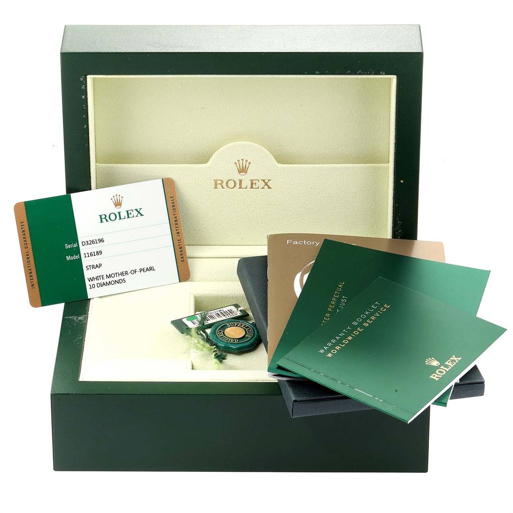 The image shows a Rolex Datejust 116189 Men's White Gold Mother of Pearl Dial 116189 Men's White Gold Mother of Pearl Dial watch box with warranty cards, manuals, a tag, and accessories.
