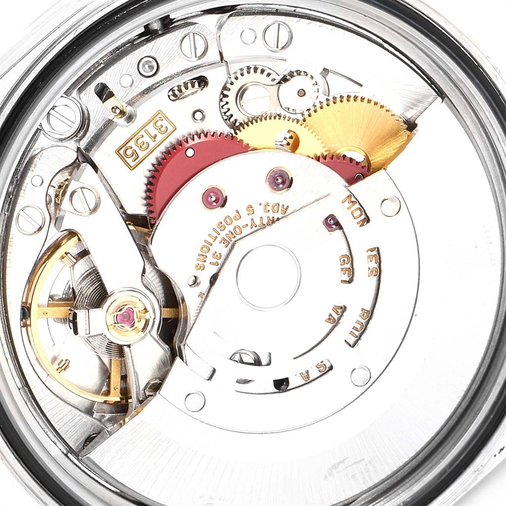 The image shows a close-up of the movement and internal mechanism of a Rolex Datejust 16233 Men's Steel and Gold (two tone) Grey Dial 16233 Men's Steel and Gold (two tone) Grey Dial watch.