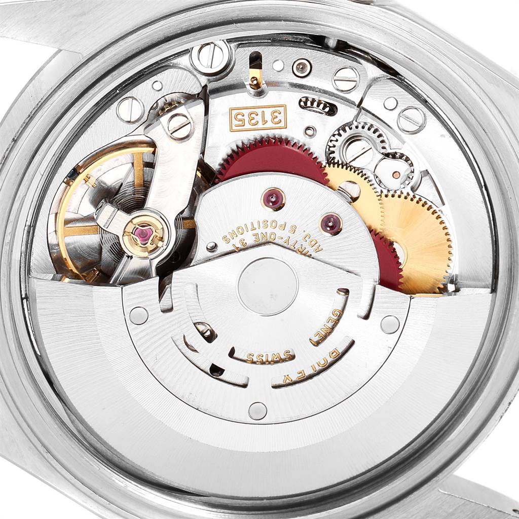 This image displays the internal mechanical movement of a Rolex Datejust 16234 Men's Stainless Steel White Dial 16234 Men's Stainless Steel White Dial watch from a close-up angle.
