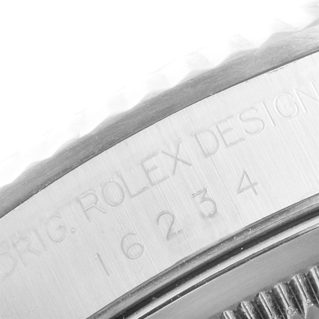 The image shows a close-up side view of the case with engraved details on the Rolex Datejust 16234 Men's Stainless Steel Silver Dial 16234 Men's Stainless Steel Silver Dial watch model 16234.