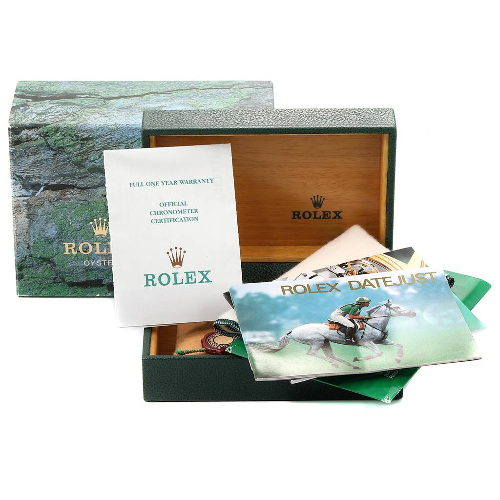 This image shows the packaging and documentation for a Rolex Datejust 16234 Men's Stainless Steel Silver Dial 16234 Men's Stainless Steel Silver Dial watch, including the outer box, inner box, warranty card, and booklets.