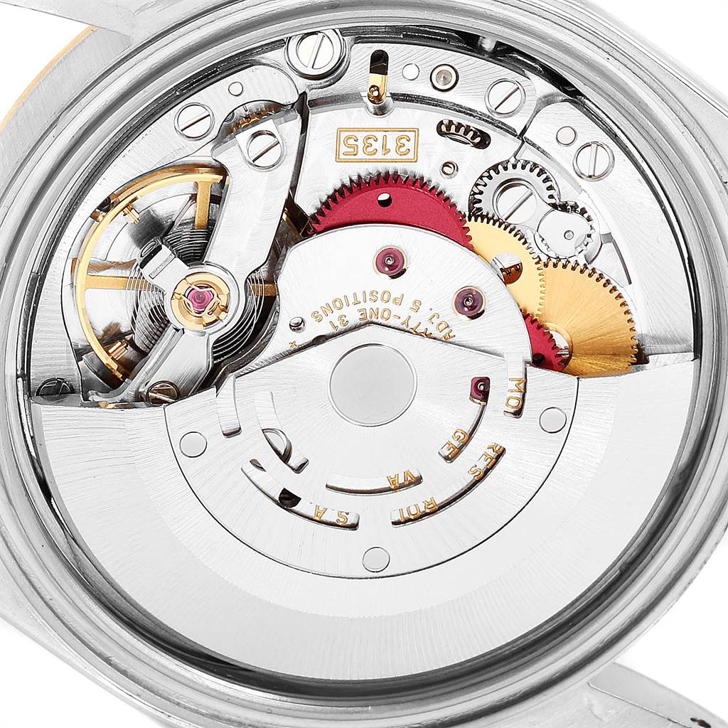 This image shows the movement mechanism of a Rolex Datejust 16233 Men
s Steel and Gold (two tone) Blue Dial 16233 Men
s Steel and Gold (two tone) Blue Dial watch from an inside angle.