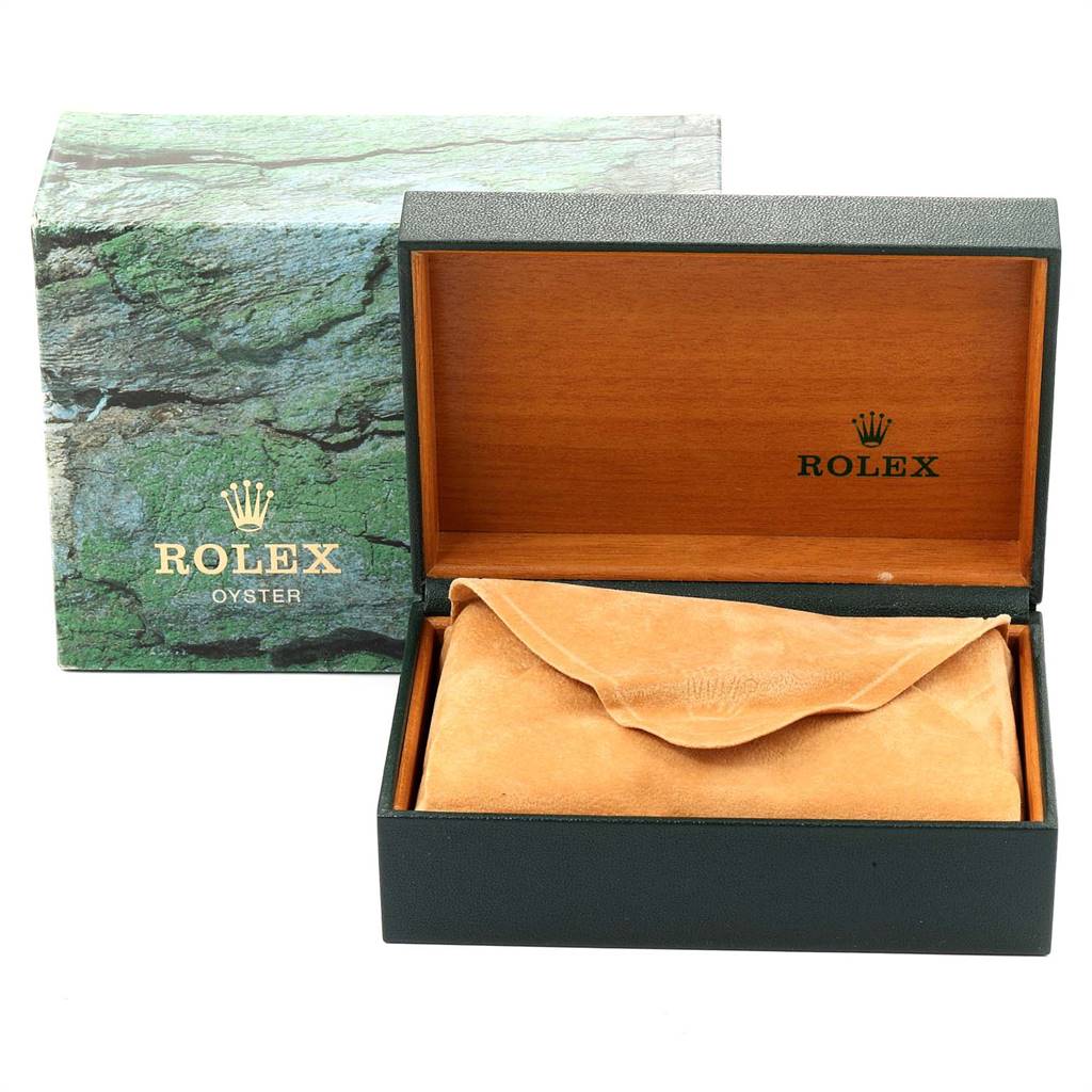 This image shows a Rolex Datejust 16233 Men
s Steel and Gold (two tone) Black Dial 16233 Men
s Steel and Gold (two tone) Black Dial watch box, containing a velvet pouch, accompanied by a matching outer case.