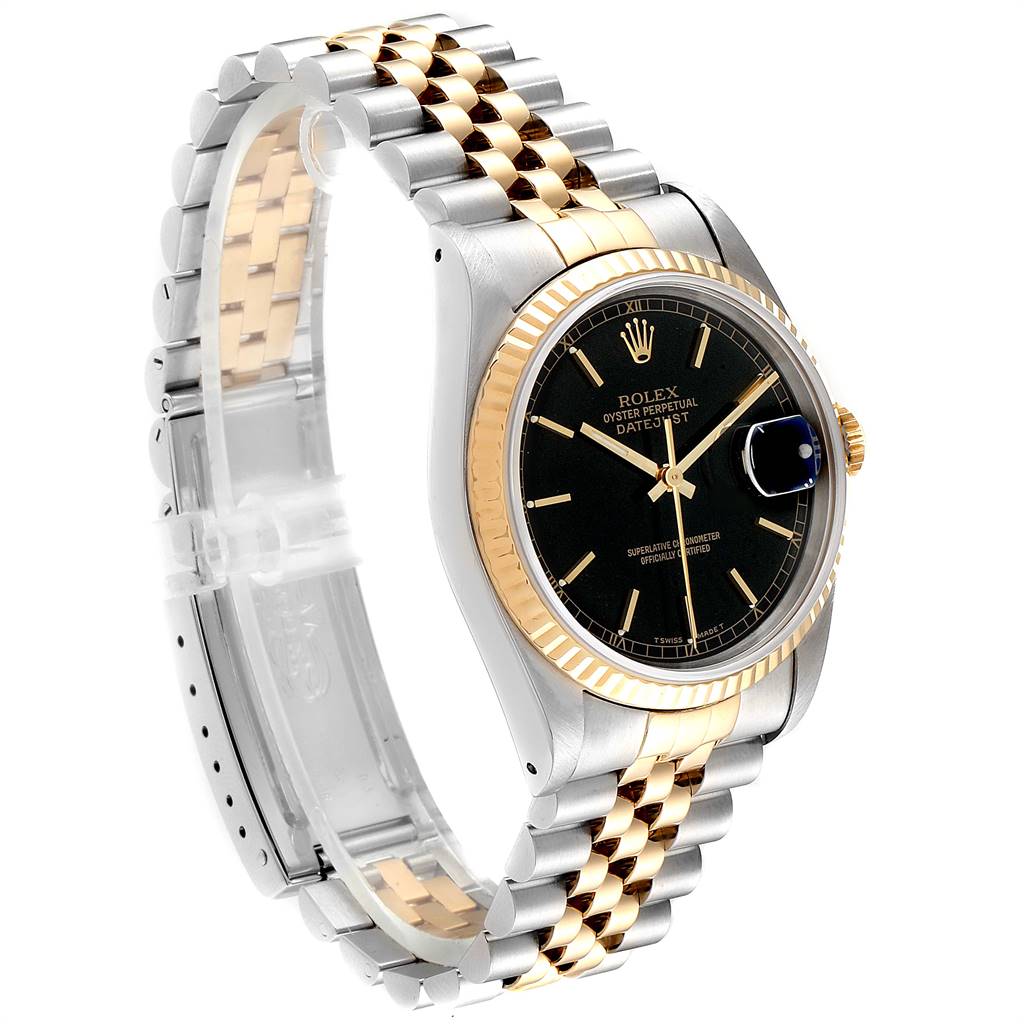 This image shows a Rolex Datejust 16233 Men
s Steel and Gold (two tone) Black Dial 16233 Men
s Steel and Gold (two tone) Black Dial watch from a front-side angle, highlighting the black dial, fluted bezel, and two-tone bracelet.