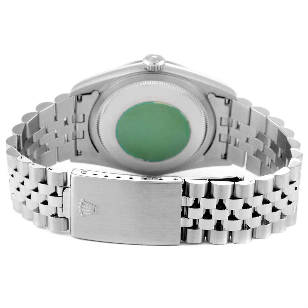 The image shows the back view of a Rolex Datejust 16234 Men's Stainless Steel Silver Dial 16234 Men's Stainless Steel Silver Dial watch, highlighting its clasp and caseback.