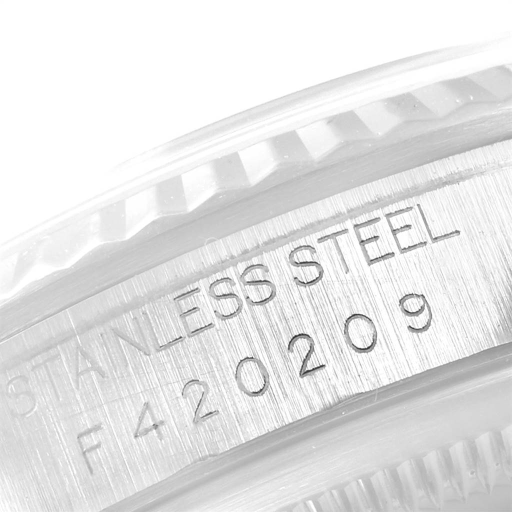 This close-up image shows the side of the casing and the serial number of a Rolex Datejust 16234 Men's Stainless Steel Silver Dial 16234 Men's Stainless Steel Silver Dial watch.