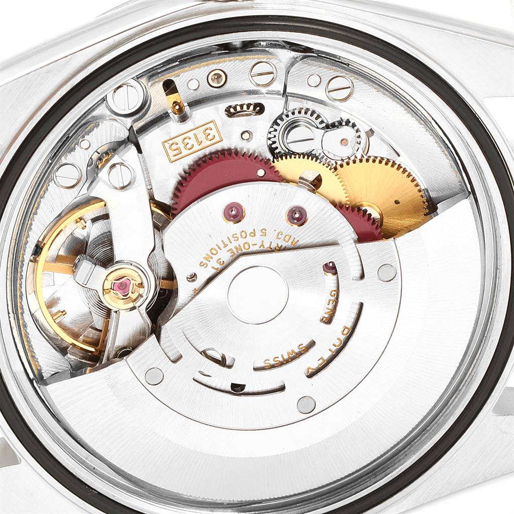 This is a close-up view of the Rolex Datejust 16234 Men's Stainless Steel Silver Dial 16234 Men's Stainless Steel Silver Dial model's intricate internal mechanical movement.