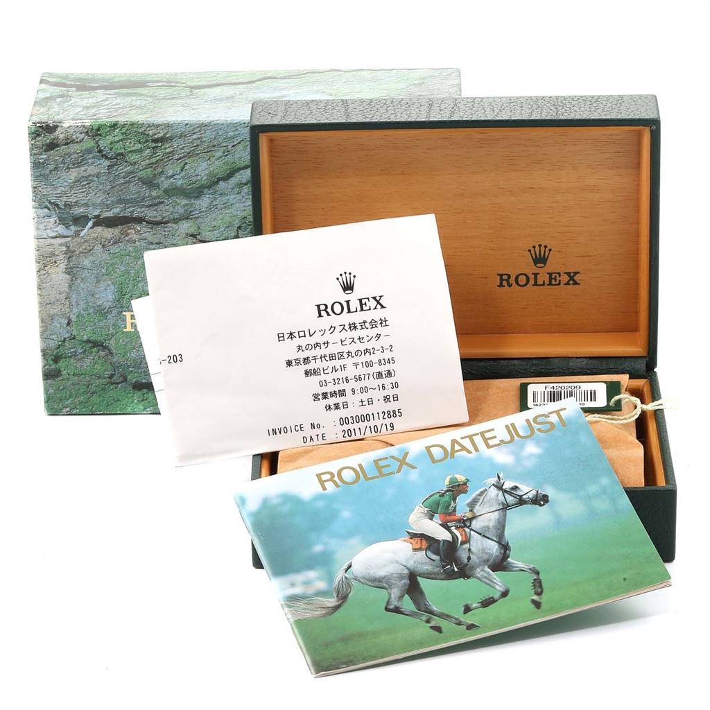 The image shows a Rolex Datejust 16234 Men's Stainless Steel Silver Dial 16234 Men's Stainless Steel Silver Dial watch box, an instruction manual, and a hangtag from a high-angle view.