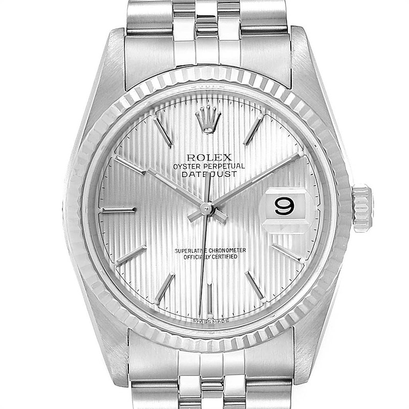 The image shows a front view of a Rolex Datejust watch, highlighting its dial, fluted bezel, and bracelet.