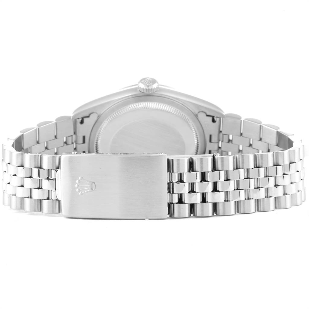 The image shows the back view of a Rolex Datejust 16234 Men's Stainless Steel Silver Dial 16234 Men's Stainless Steel Silver Dial watch, highlighting its case back, crown, and Jubilee bracelet with clasp.