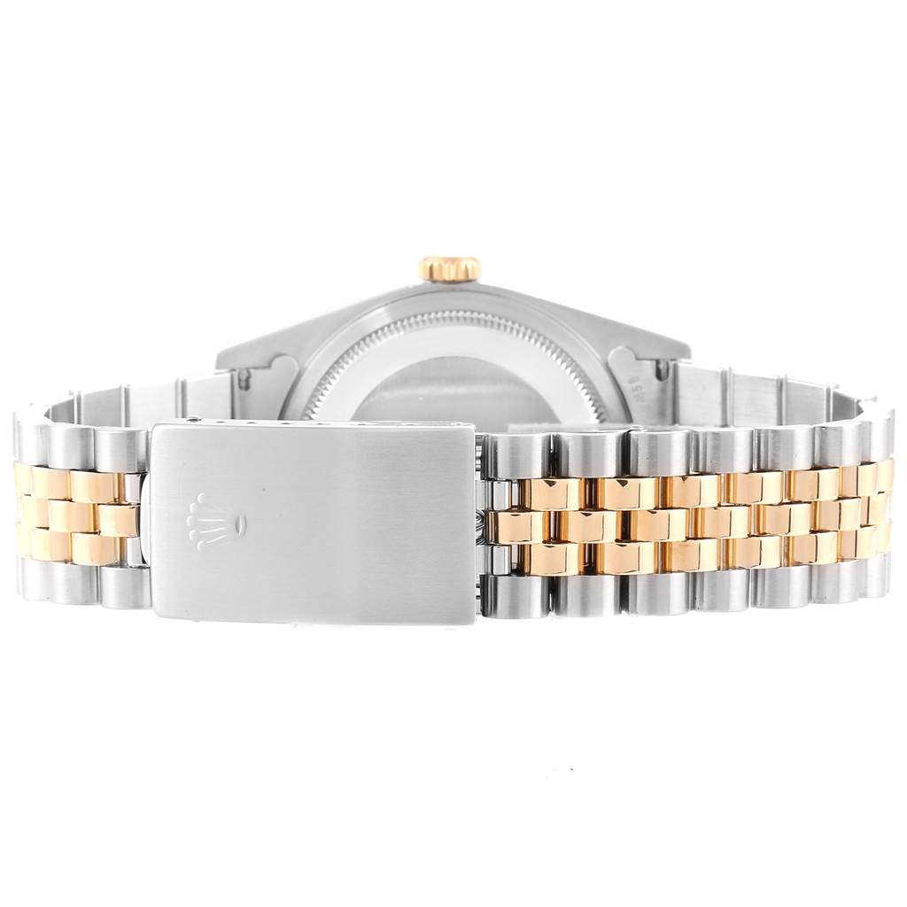 This image shows the back view of a Rolex Datejust 16233 Men's Steel and Gold (two tone) White Dial 16233 Men's Steel and Gold (two tone) White Dial watch, featuring its clasp and two-tone bracelet.
