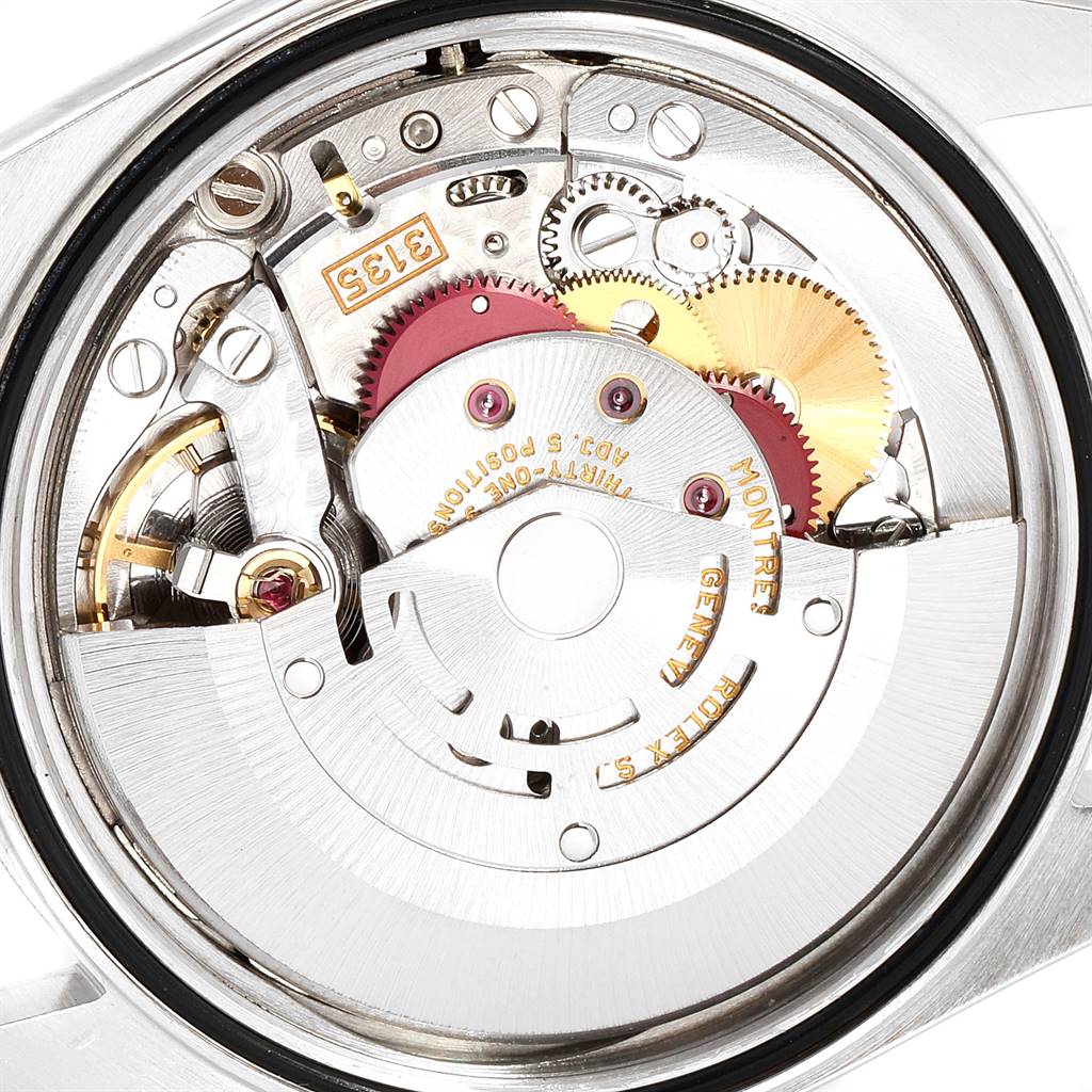 This image shows the intricate movement and internal mechanics of a Rolex Datejust 16234 Men's Stainless Steel Silver Dial 16234 Men's Stainless Steel Silver Dial watch from a close-up angle.