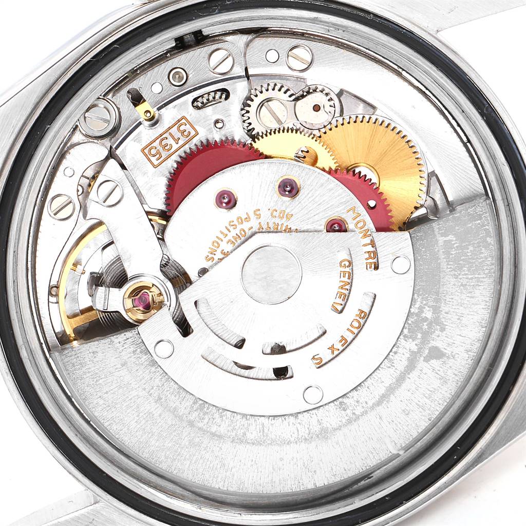This image shows the internal mechanical movement parts of the Rolex Datejust 16233 Men
s Steel and Gold (two tone) Beige Dial 16233 Men
s Steel and Gold (two tone) Beige Dial watch from a back angle.