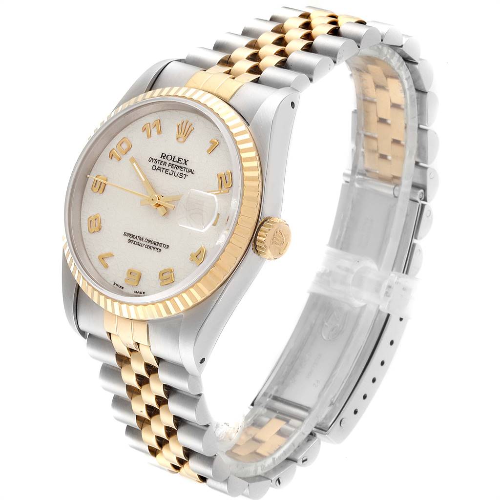 The image shows a Rolex Datejust 16233 Men
s Steel and Gold (two tone) Beige Dial 16233 Men
s Steel and Gold (two tone) Beige Dial watch from a three-quarter angle, highlighting the dial, fluted bezel, and two-tone Jubilee bracelet.