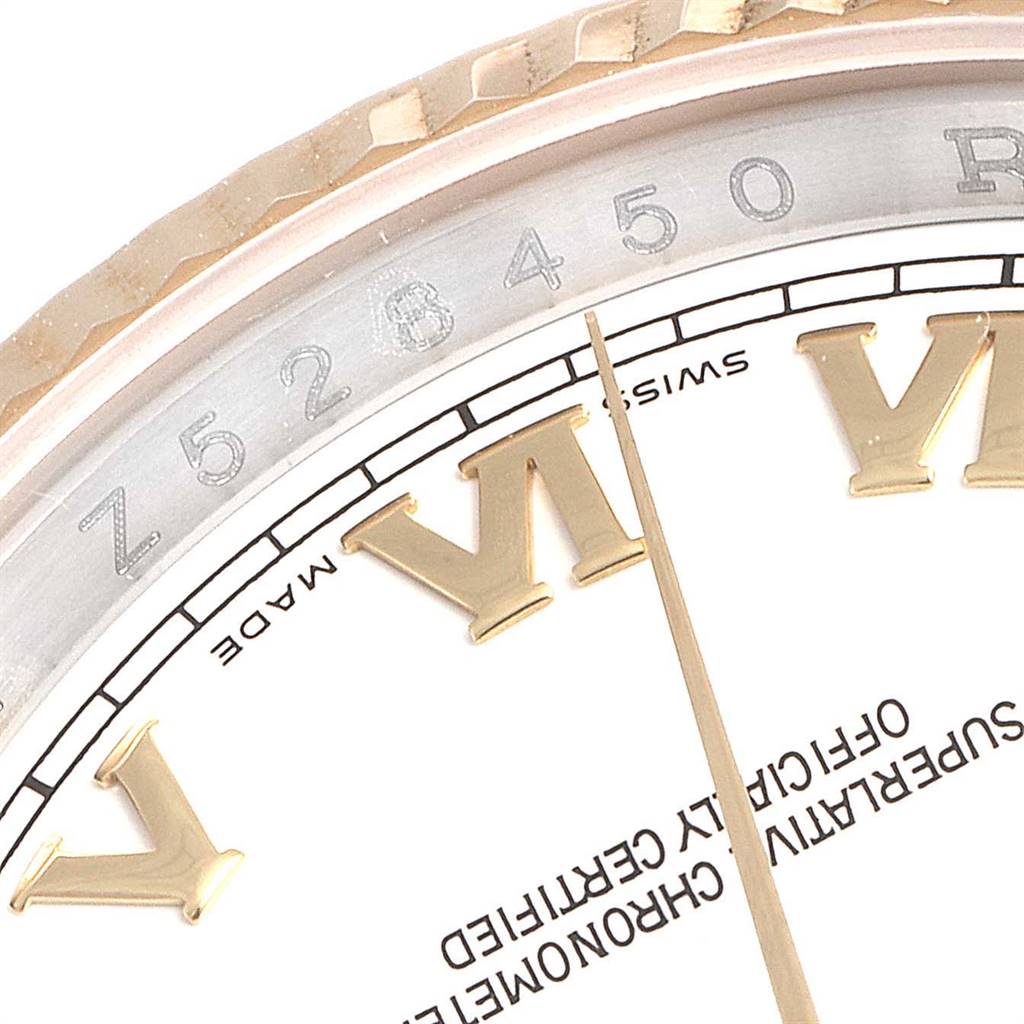 This image shows a close-up angle of the Rolex Datejust 116233 Men's Stainless Steel White Dial 116233 Men's Stainless Steel White Dial watch, highlighting the bezel, part of the dial, and Roman numeral hour markers.