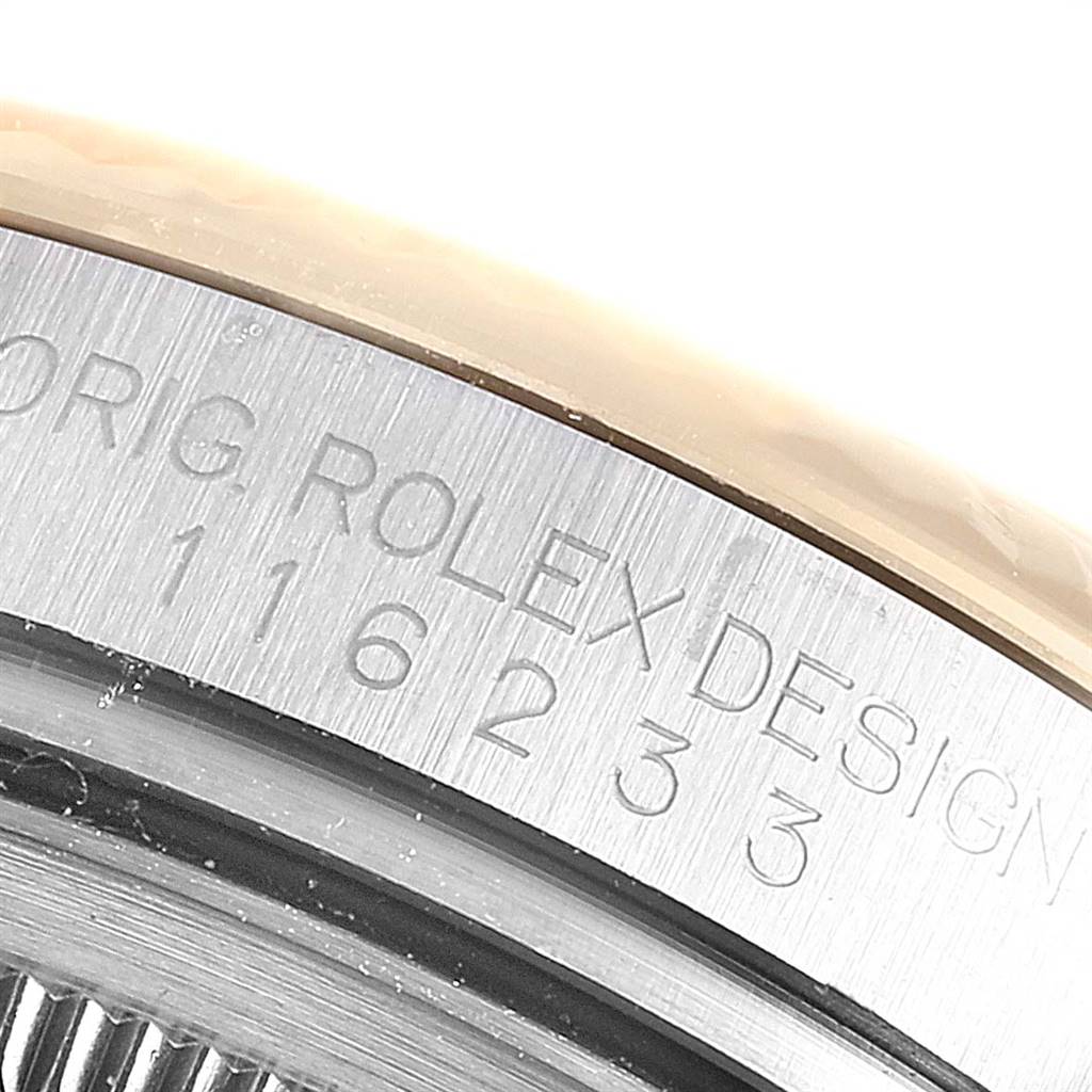 The image shows a close-up of the case back engraving on a Rolex Datejust 116233 Men's Stainless Steel White Dial 116233 Men's Stainless Steel White Dial watch.