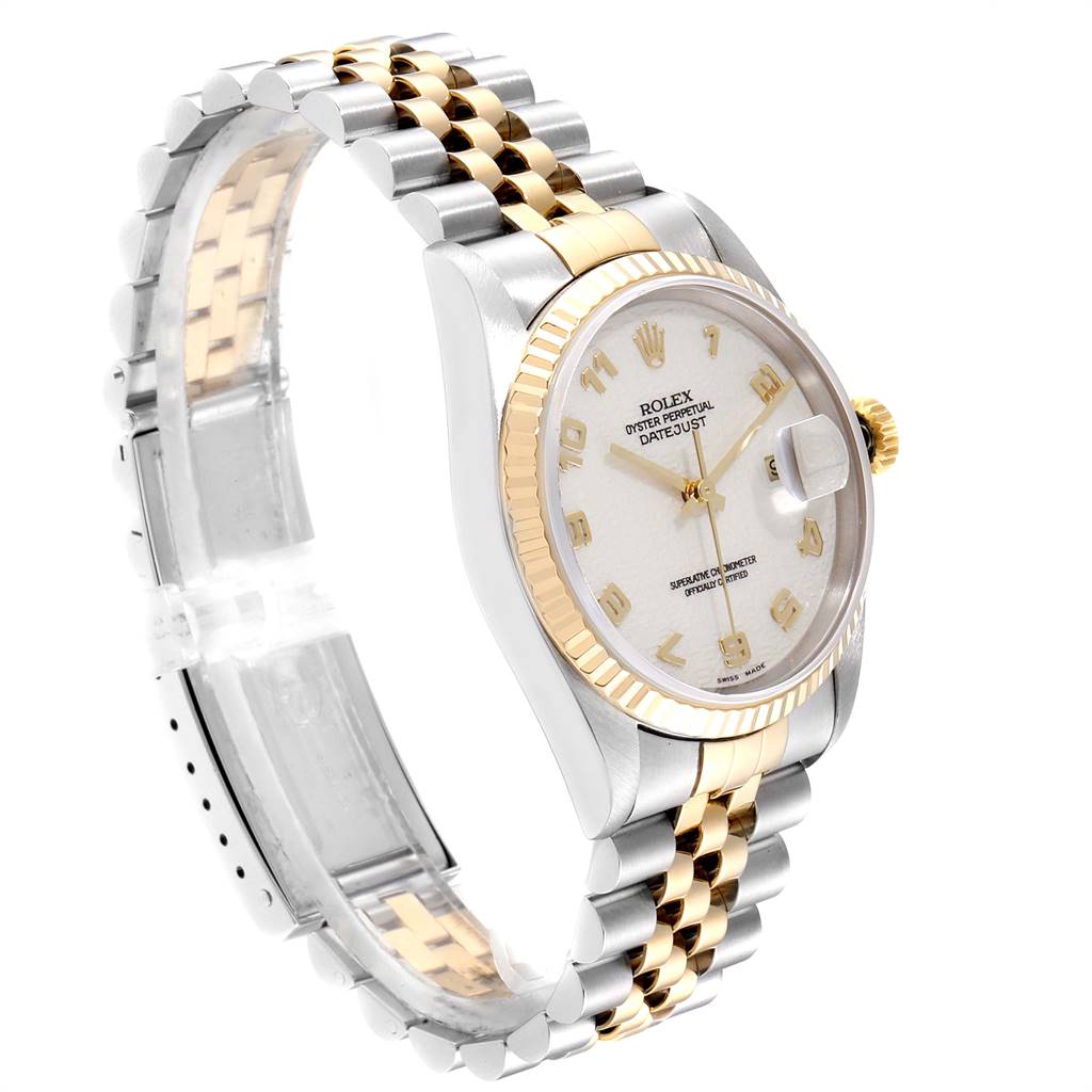 The image shows a Rolex Datejust 16233 Men's Steel and Gold (two tone) Beige Dial 16233 Men's Steel and Gold (two tone) Beige Dial watch from a side angle, highlighting its two-tone Jubilee bracelet and fluted bezel.