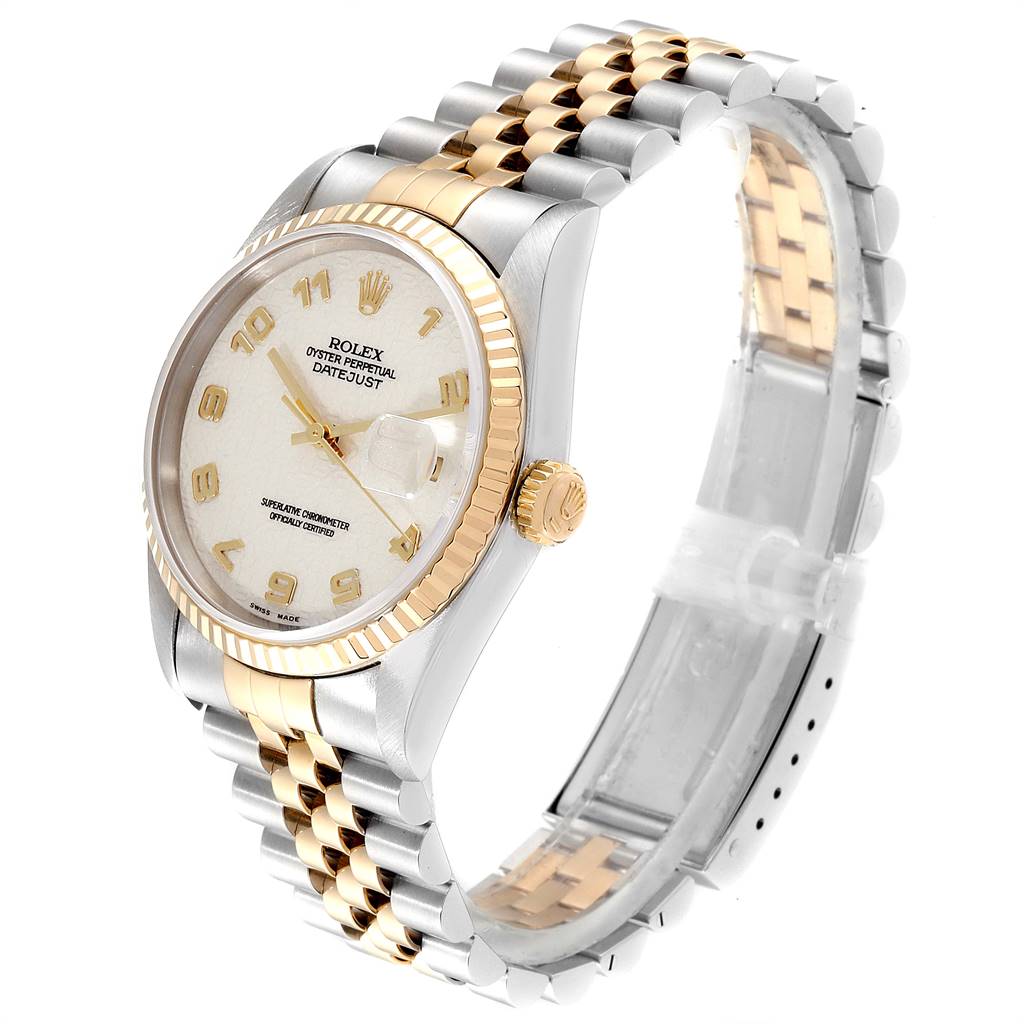 This image shows a Rolex Datejust 16233 Men's Steel and Gold (two tone) Beige Dial 16233 Men's Steel and Gold (two tone) Beige Dial watch at an angle highlighting its dial, fluted bezel, crown, and two-tone Jubilee bracelet.
