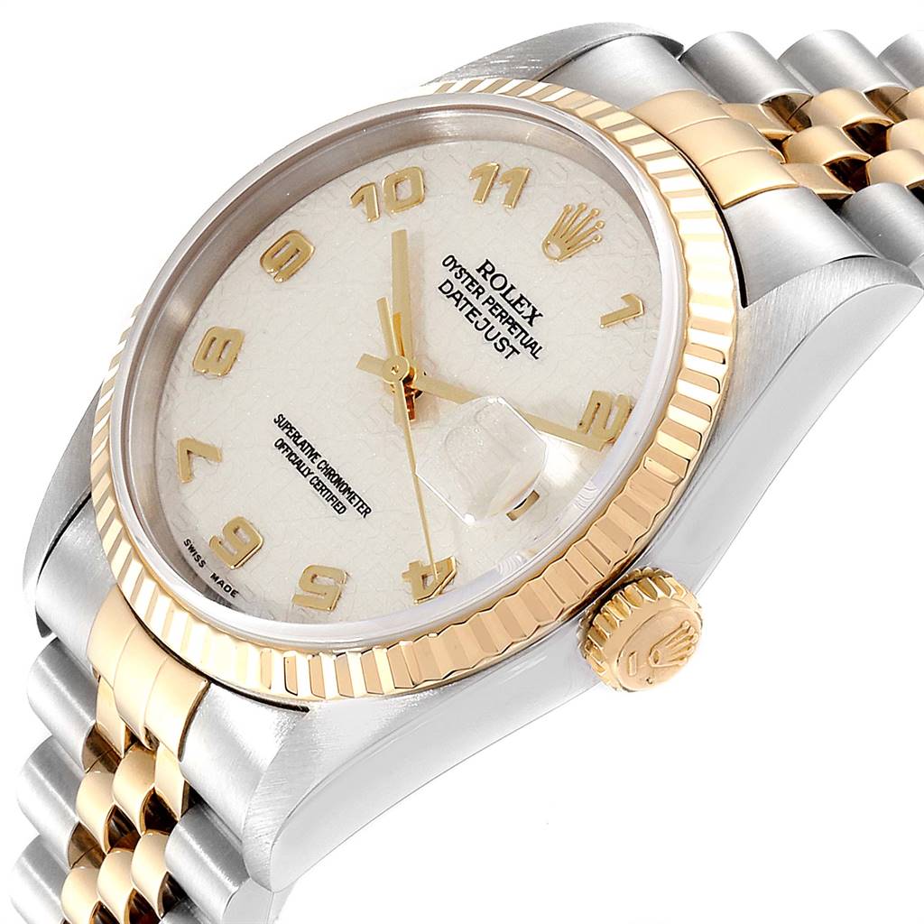 The image shows a Rolex Datejust 16233 Men's Steel and Gold (two tone) Beige Dial 16233 Men's Steel and Gold (two tone) Beige Dial watch from an angled side view, highlighting the face, bezel, crown, and part of the bracelet.