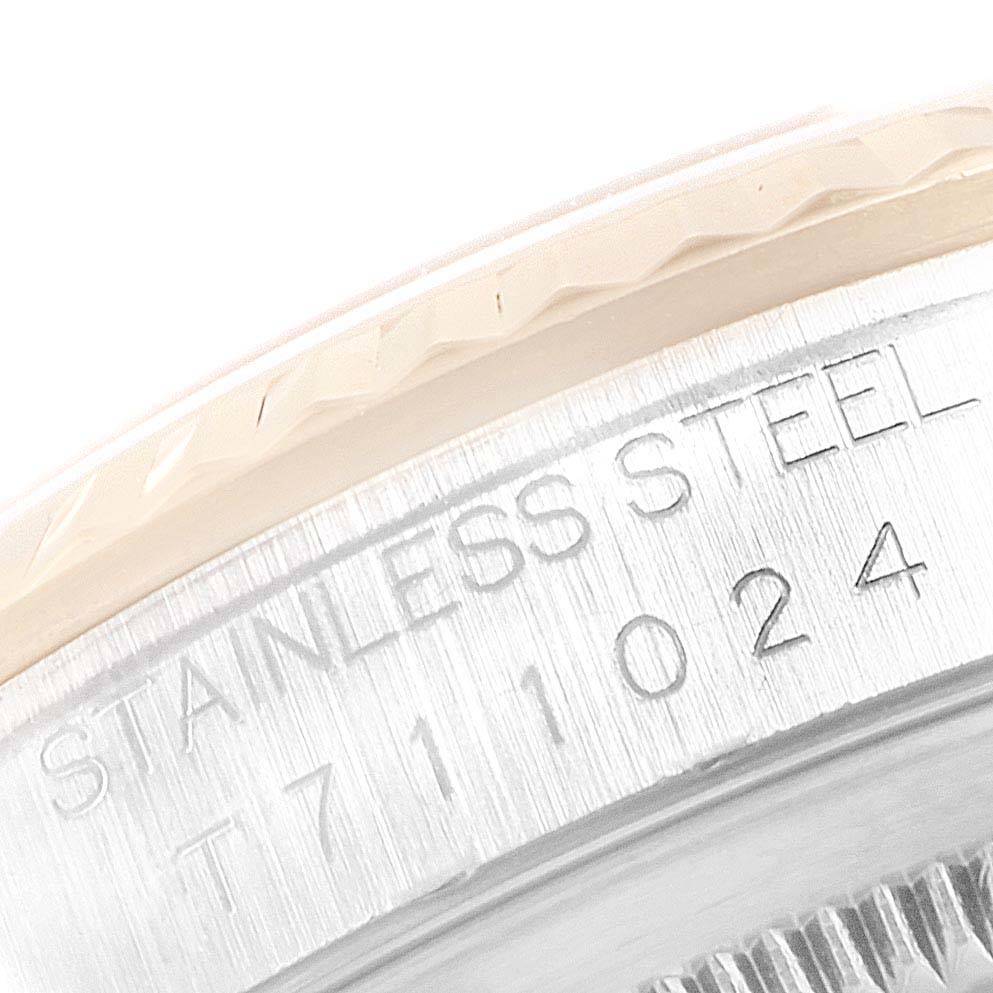 This close-up image shows the engraved stainless steel case back of a Rolex Datejust 16233 Men's Steel and Gold (two tone) Beige Dial 16233 Men's Steel and Gold (two tone) Beige Dial watch.