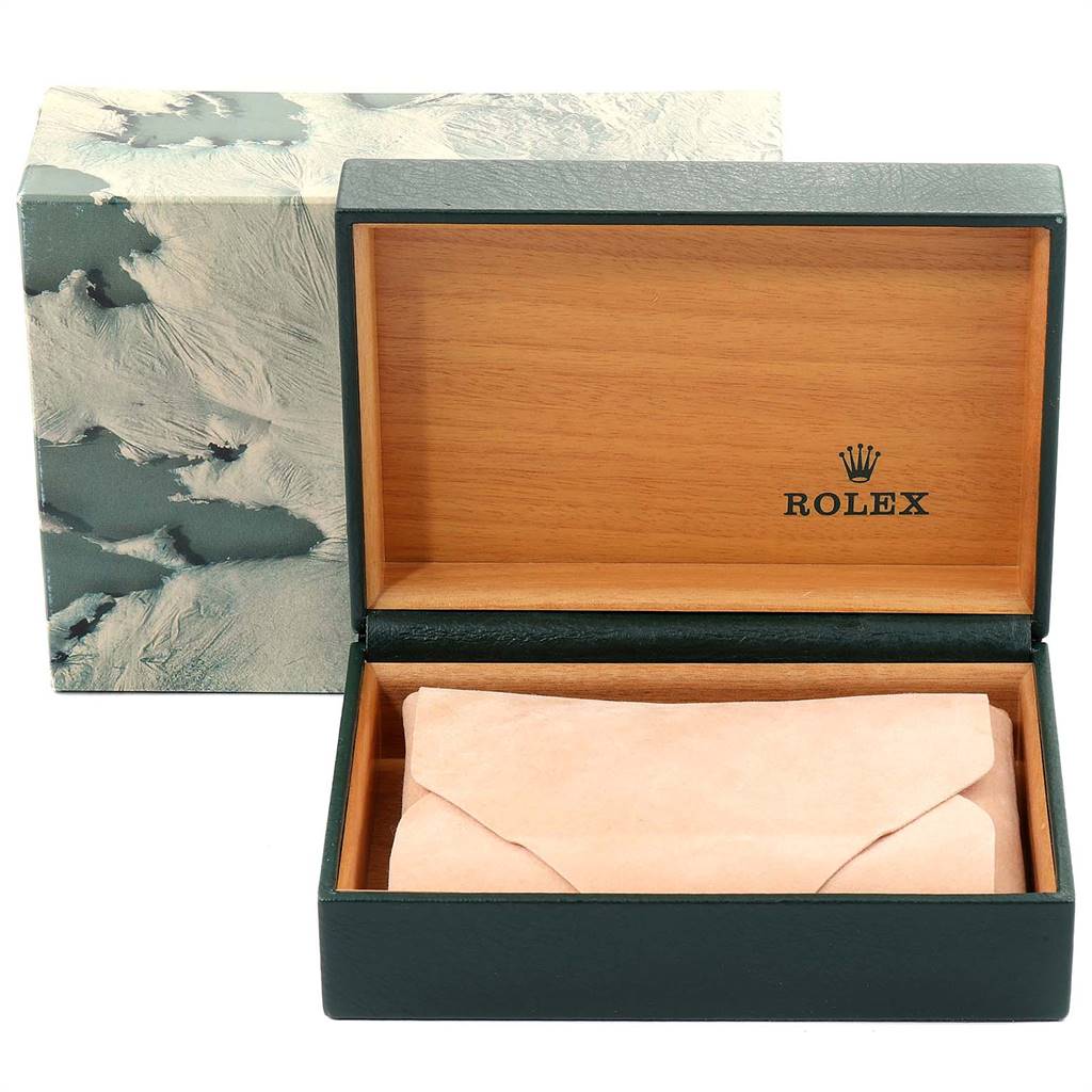 The image showcases an open Rolex Datejust 16200 Men's Stainless Steel White Dial 16200 Men's Stainless Steel White Dial watch box with a suede pouch inside, highlighting the box's interior and exterior.