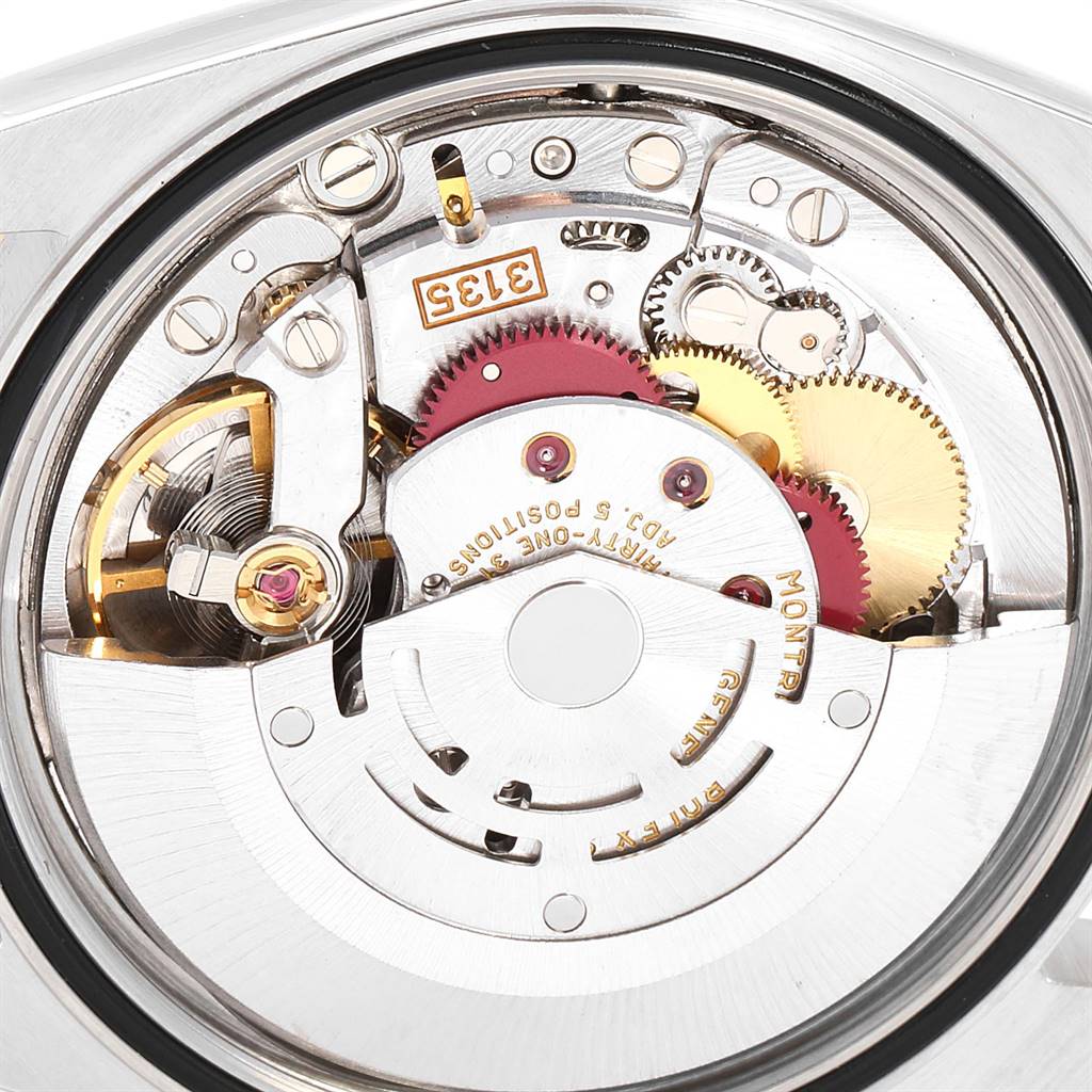 This image shows the movement mechanism of a Rolex Datejust 16233 Men
s Steel and Gold (two tone) Silver Dial 16233 Men
s Steel and Gold (two tone) Silver Dial watch from a top-down angle.