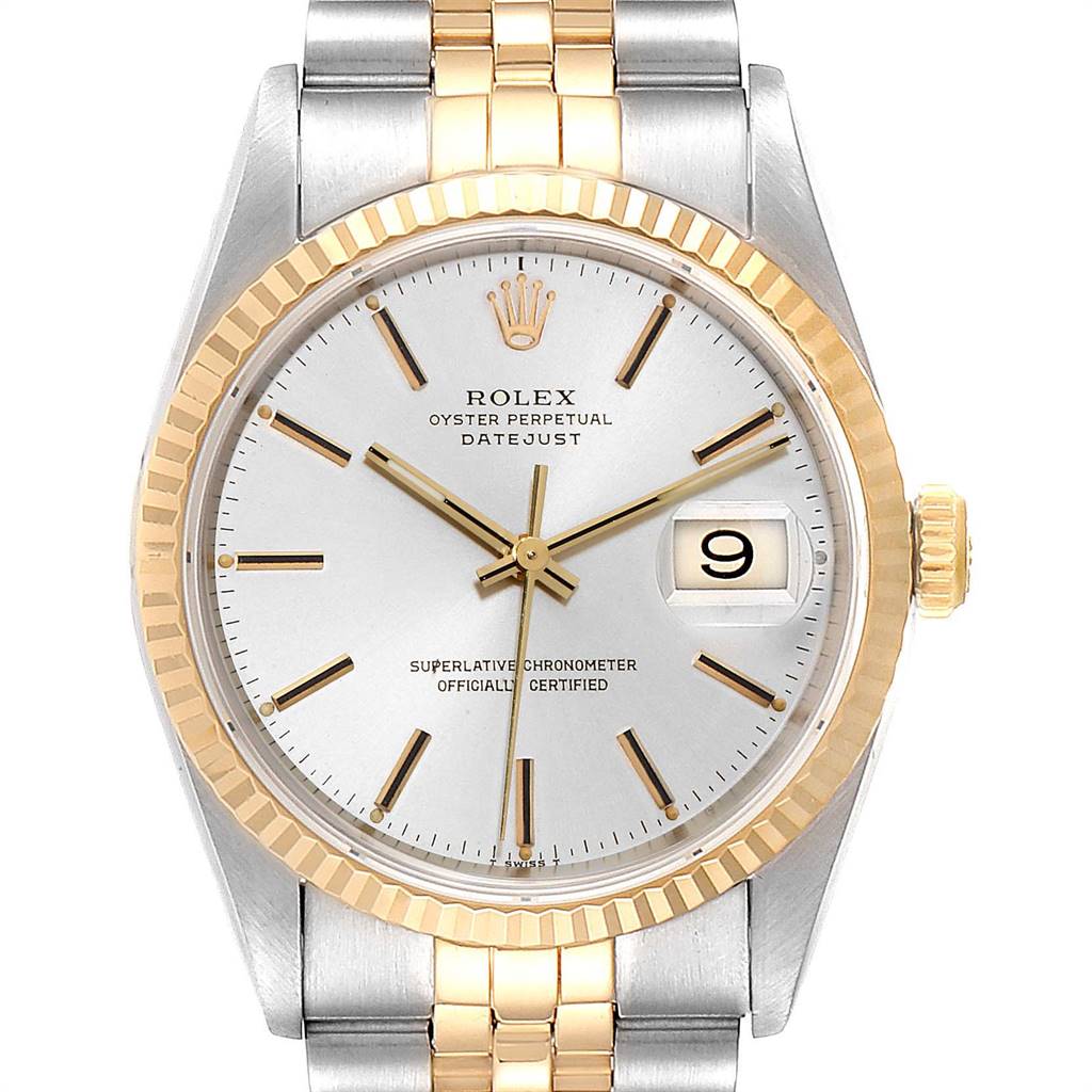 This Rolex Datejust 16233 Men
s Steel and Gold (two tone) Silver Dial 16233 Men
s Steel and Gold (two tone) Silver Dial watch is shown from a straight-on angle, highlighting the face, bezel, and part of the bracelet. 