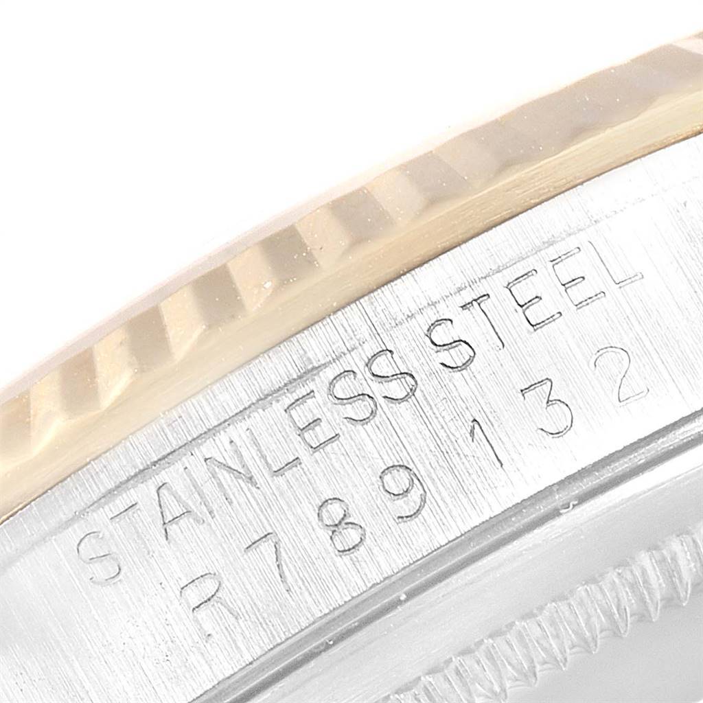 The image shows a close-up of the stainless steel case and fluted bezel of a Rolex Datejust 16233 Men's Steel and Gold (two tone) Champagne Dial 16233 Men's Steel and Gold (two tone) Champagne Dial watch.