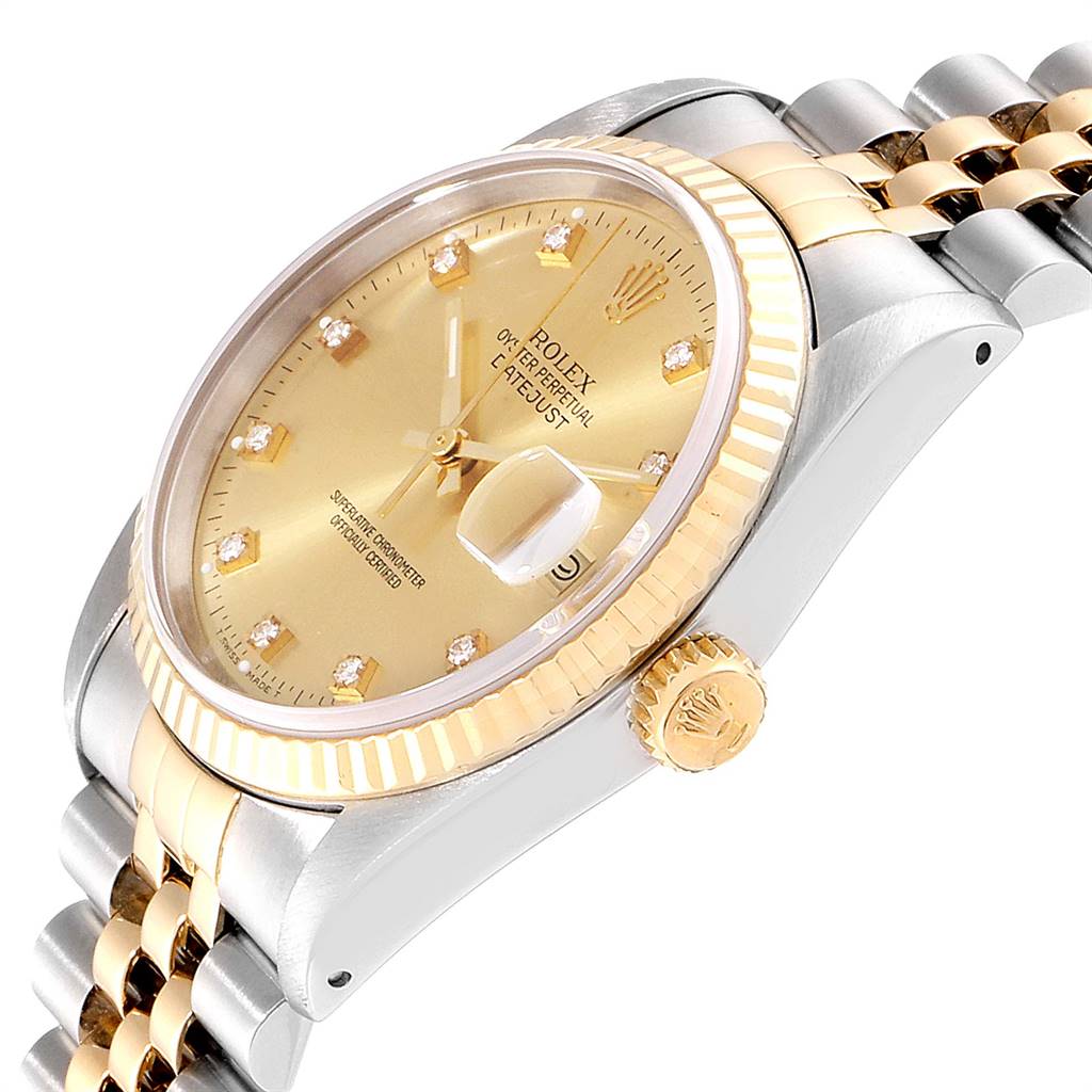 The image shows a side angle of the Rolex Datejust 16233 Men's Steel and Gold (two tone) Champagne Dial 16233 Men's Steel and Gold (two tone) Champagne Dial, highlighting the crown, fluted bezel, and part of the jubilee bracelet.