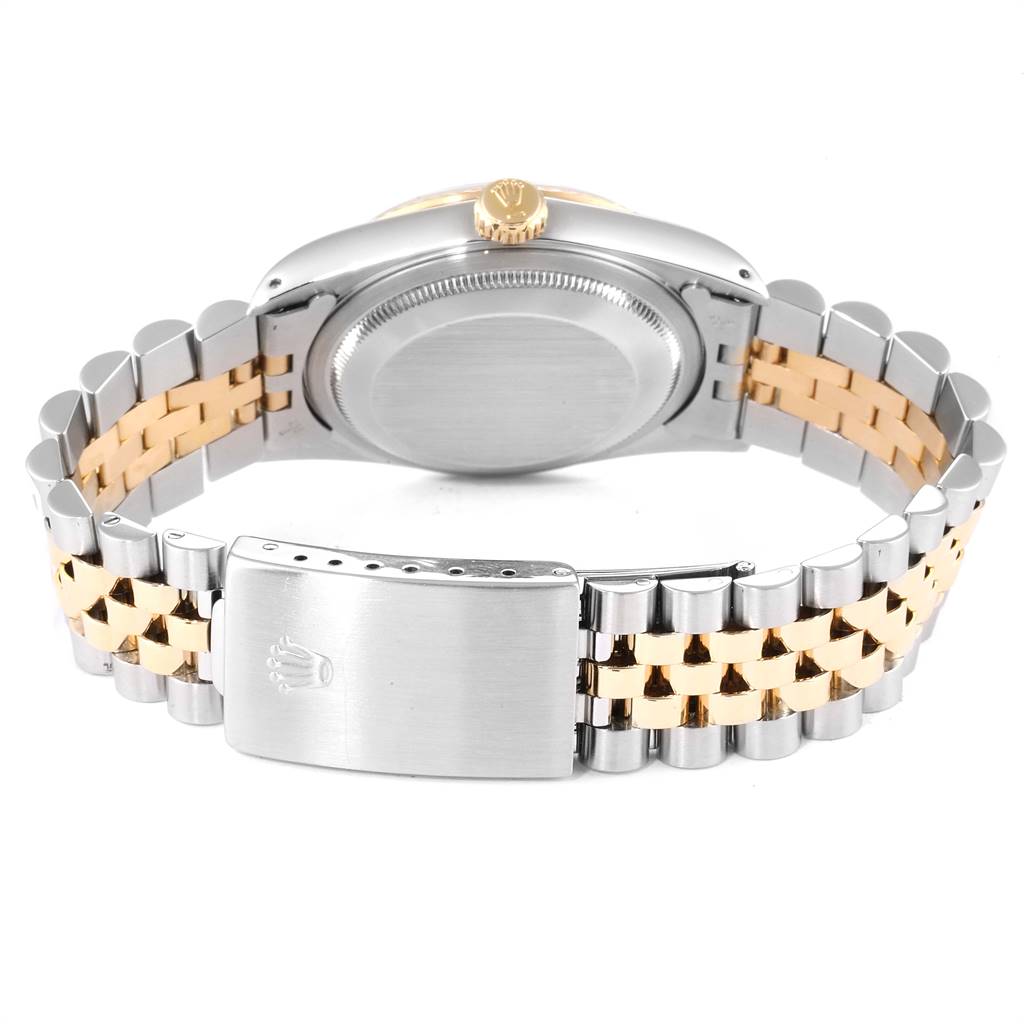 The image shows the back view of a Rolex Datejust 16233 Men's Steel and Gold (two tone) Champagne Dial 16233 Men's Steel and Gold (two tone) Champagne Dial watch, highlighting the clasp, bracelet, and case back.