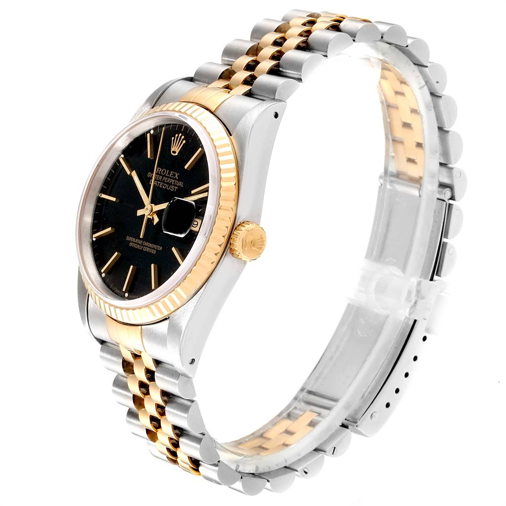 This Rolex Datejust 16233 Men
s Steel and Gold (two tone) Black Dial 16233 Men
s Steel and Gold (two tone) Black Dial watch is shown at a slight angle from the front, highlighting its dial, bezel, crown, and bracelet.