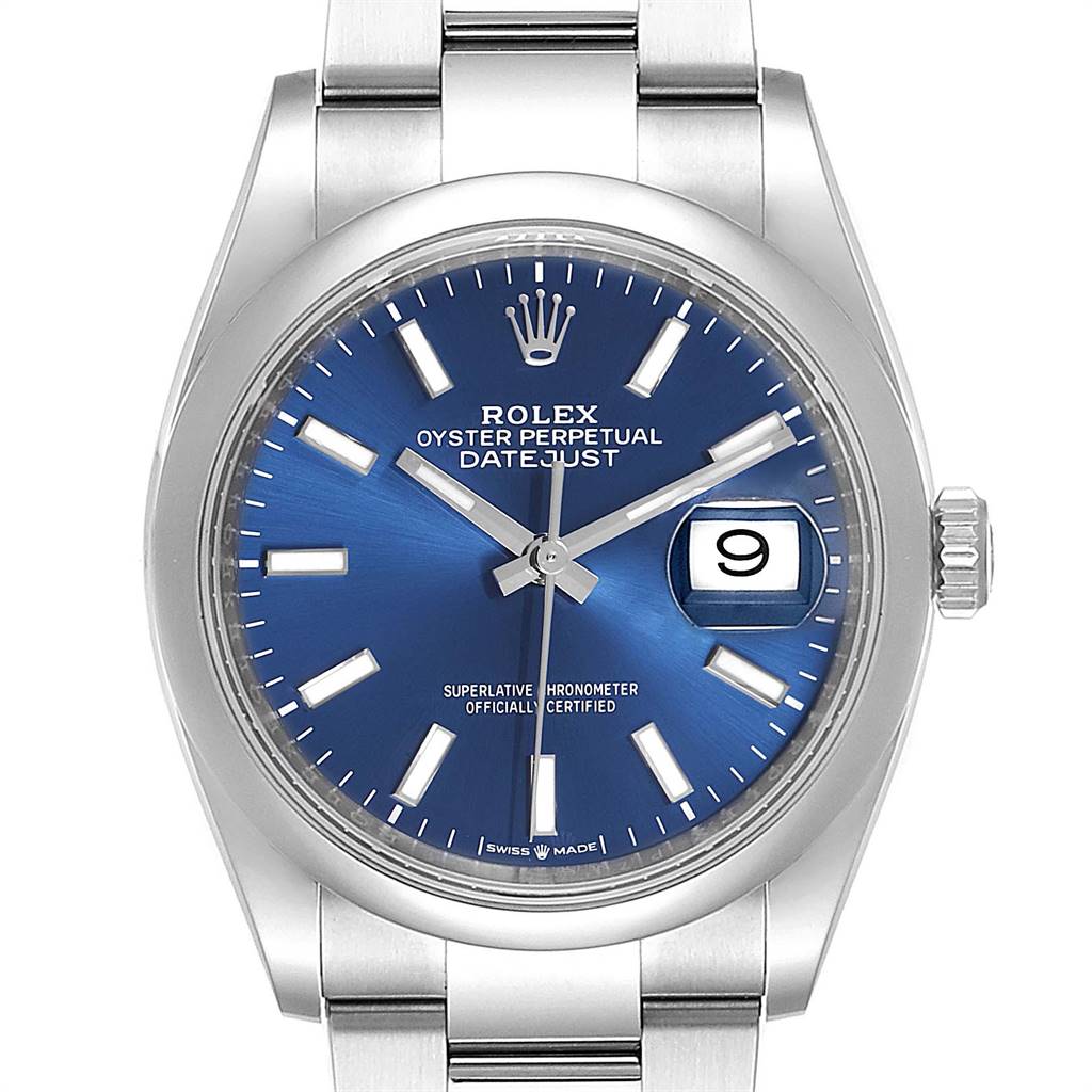 The image shows a front view of a Rolex Datejust 126200 Men's Stainless Steel Blue Dial 126200 Men's Stainless Steel Blue Dial watch with a blue dial, showcasing its face and part of the bracelet.