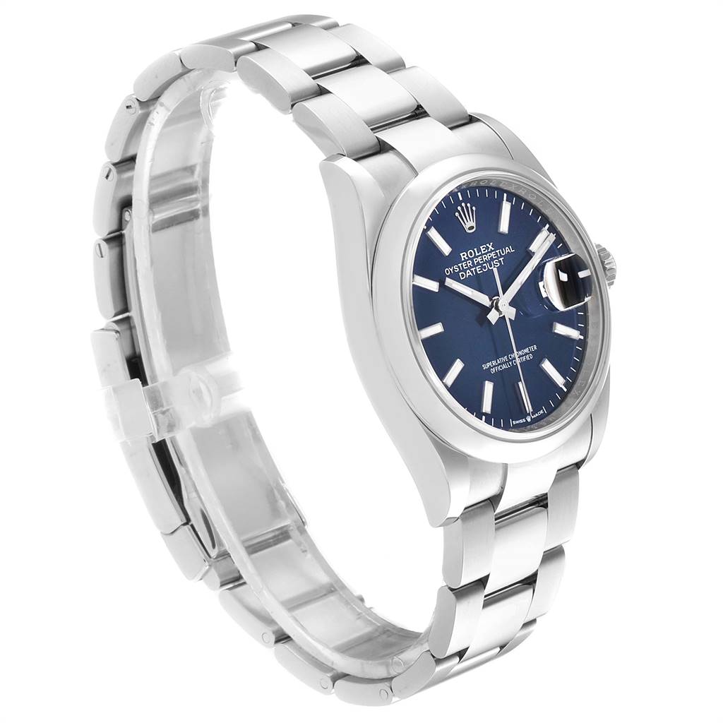 The Rolex Datejust 126200 Men's Stainless Steel Blue Dial 126200 Men's Stainless Steel Blue Dial watch is shown from a three-quarter angle, highlighting its bracelet, case, and blue dial.