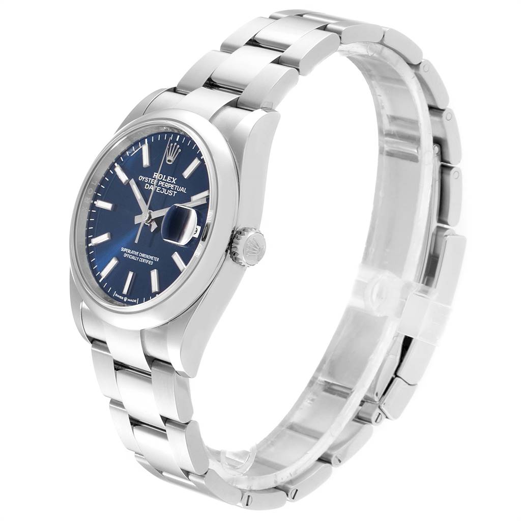 This image shows a side angle of a Rolex Datejust 126200 Men's Stainless Steel Blue Dial 126200 Men's Stainless Steel Blue Dial watch, displaying the face, crown, and metal bracelet.