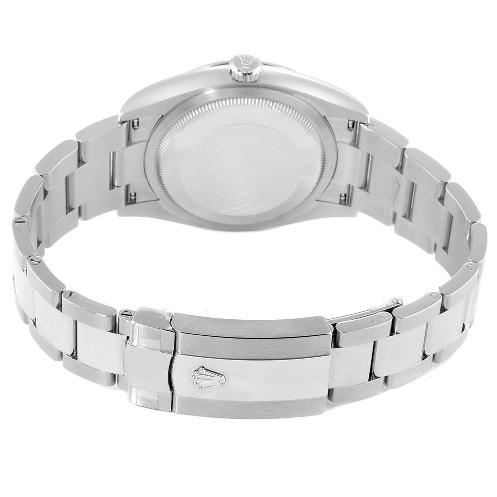 The image shows the back view of a Rolex Datejust 126200 Men's Stainless Steel Blue Dial 126200 Men's Stainless Steel Blue Dial watch, highlighting the case back and bracelet with the clasp.