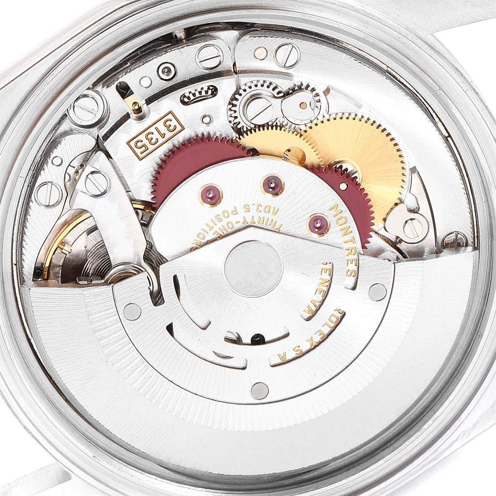 This image shows the intricate internal mechanism and gears of a Rolex Datejust 16234 Men's Stainless Steel Mother of Pearl Dial 16234 Men's Stainless Steel Mother of Pearl Dial watch from a back angle.