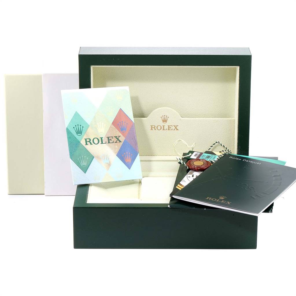 The image shows the opened packaging of a Rolex Datejust 16234 Men's Stainless Steel Mother of Pearl Dial 16234 Men's Stainless Steel Mother of Pearl Dial watch including the box, booklets, tags, and documentation.