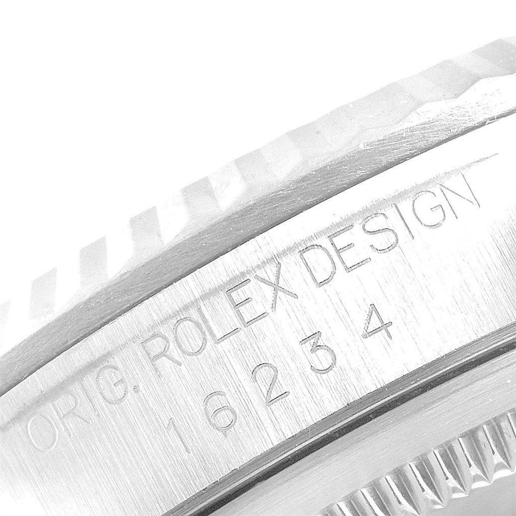 The image shows a close-up of the watch serial and model number engraving on the case of a Rolex Datejust 16234 Men's Stainless Steel Mother of Pearl Dial 16234 Men's Stainless Steel Mother of Pearl Dial.