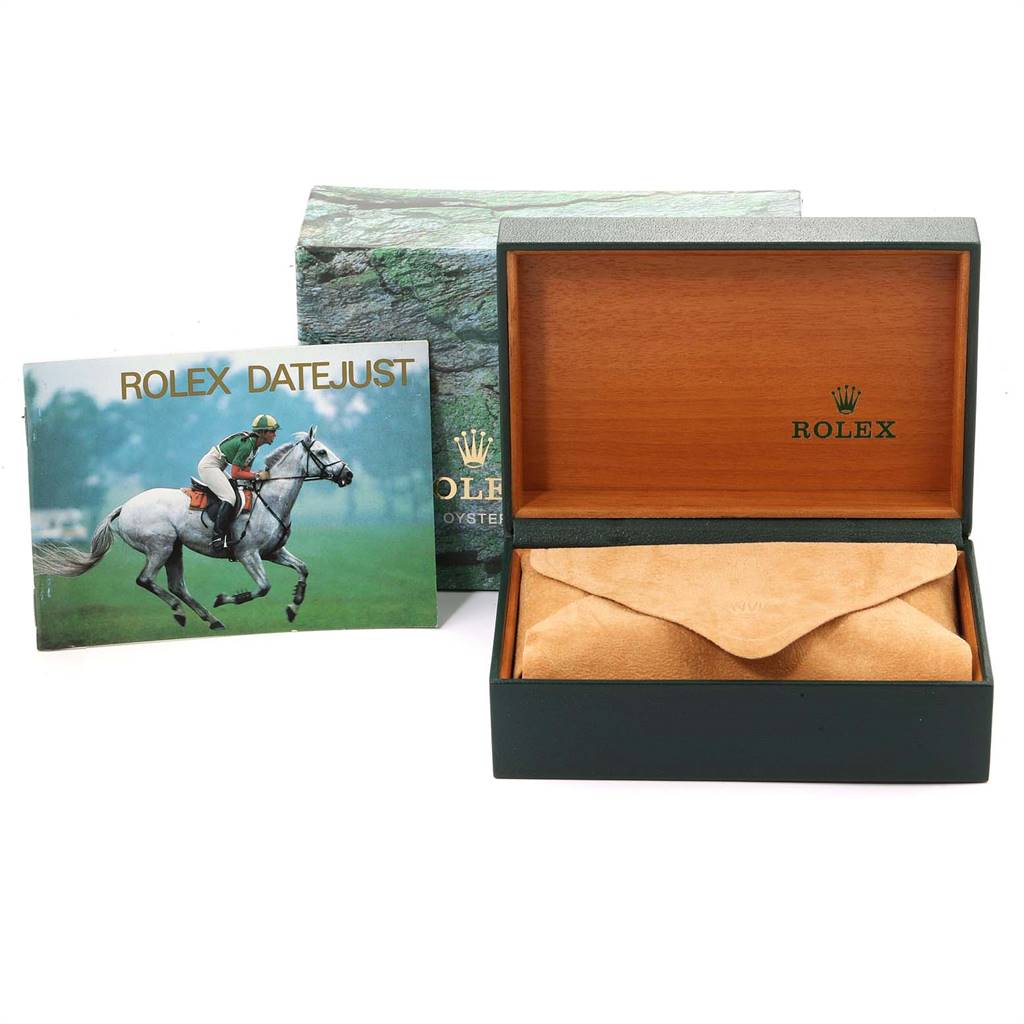 The image shows a Rolex Datejust 16233 Men
s Steel and Gold (two tone) Champagne Dial 16233 Men
s Steel and Gold (two tone) Champagne Dial model box, a manual, and a leather pouch.