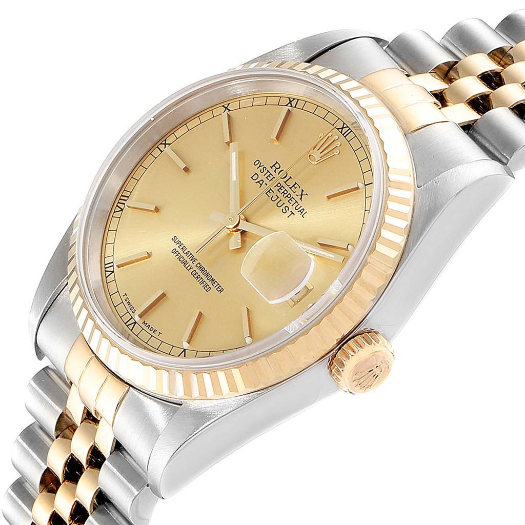 The image shows a side angle view of a Rolex Datejust 16233 Men
s Steel and Gold (two tone) Champagne Dial 16233 Men
s Steel and Gold (two tone) Champagne Dial watch, displaying its dial, bezel, crown, and part of the bracelet.