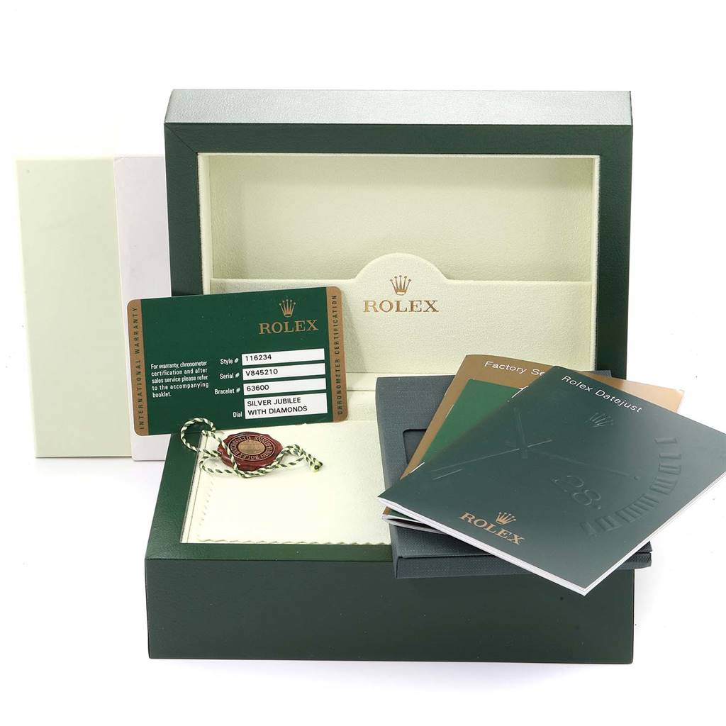 The image shows the original packaging, booklets, warranty card, and tags for a Rolex Datejust 116234 Men's Stainless Steel Silver Dial 116234 Men's Stainless Steel Silver Dial watch, taken from the front angle.