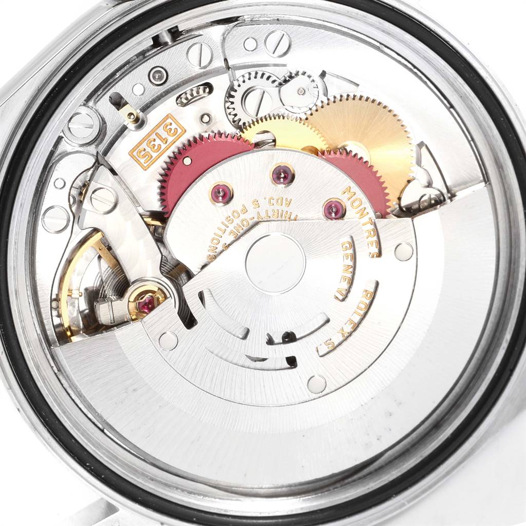 This image shows the internal movement mechanism of a Rolex Datejust 16233 Men's Steel and Gold (two tone) Champagne Dial 16233 Men's Steel and Gold (two tone) Champagne Dial watch from a rear angle.