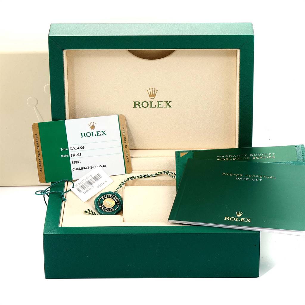 The image shows the open box of a Rolex Datejust 126233 Men's Steel and Gold (two tone) Champagne Dial 126233 Men's Steel and Gold (two tone) Champagne Dial model, along with warranty booklets, tags, and a serial/model card.
