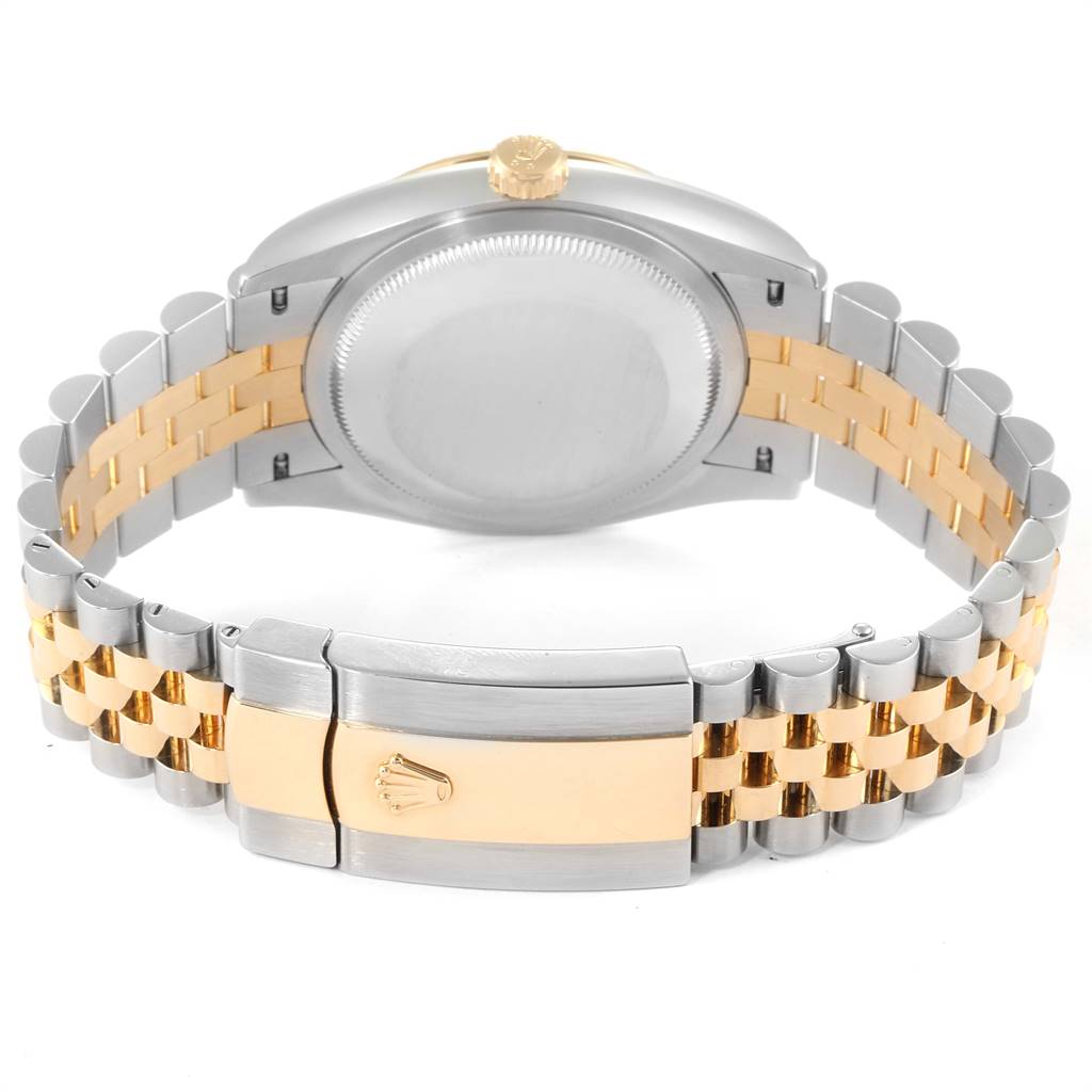 The image shows the back case and the two-tone bracelet of a Rolex Datejust 126233 Men's Steel and Gold (two tone) Champagne Dial 126233 Men's Steel and Gold (two tone) Champagne Dial watch.