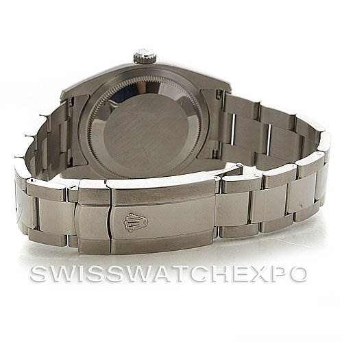 The image shows the back view of a Rolex Datejust 116200 Men's Stainless Steel Black Dial 116200 Men's Stainless Steel Black Dial watch, highlighting its clasp, bracelet, and case.