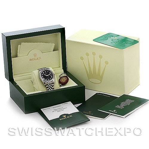 The image shows a Rolex Datejust 116200-BKRJ Men
s Stainless Steel Black Dial 116200-BKRJ Men
s Stainless Steel Black Dial watch with its box, manuals, and accessories from a front angle.